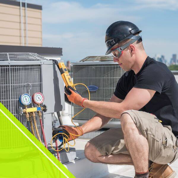 HVAC tech working on an AC